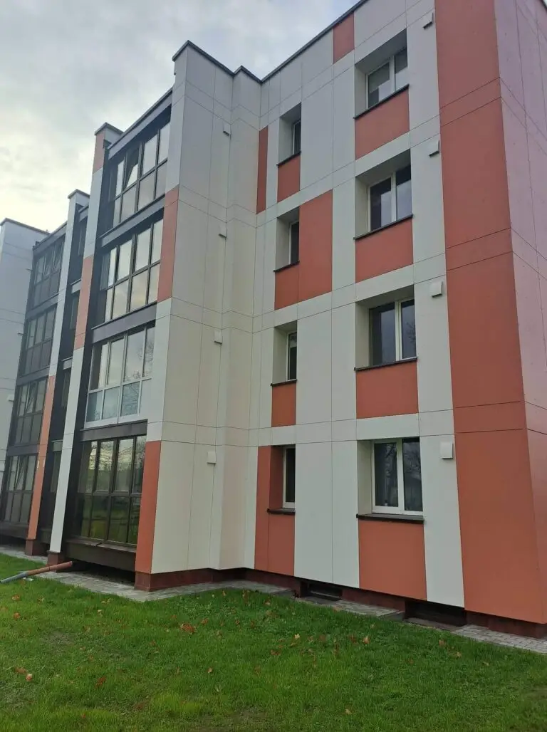 Decentralized regenerative ventilation units installed in renovated multi-storey residential building facade