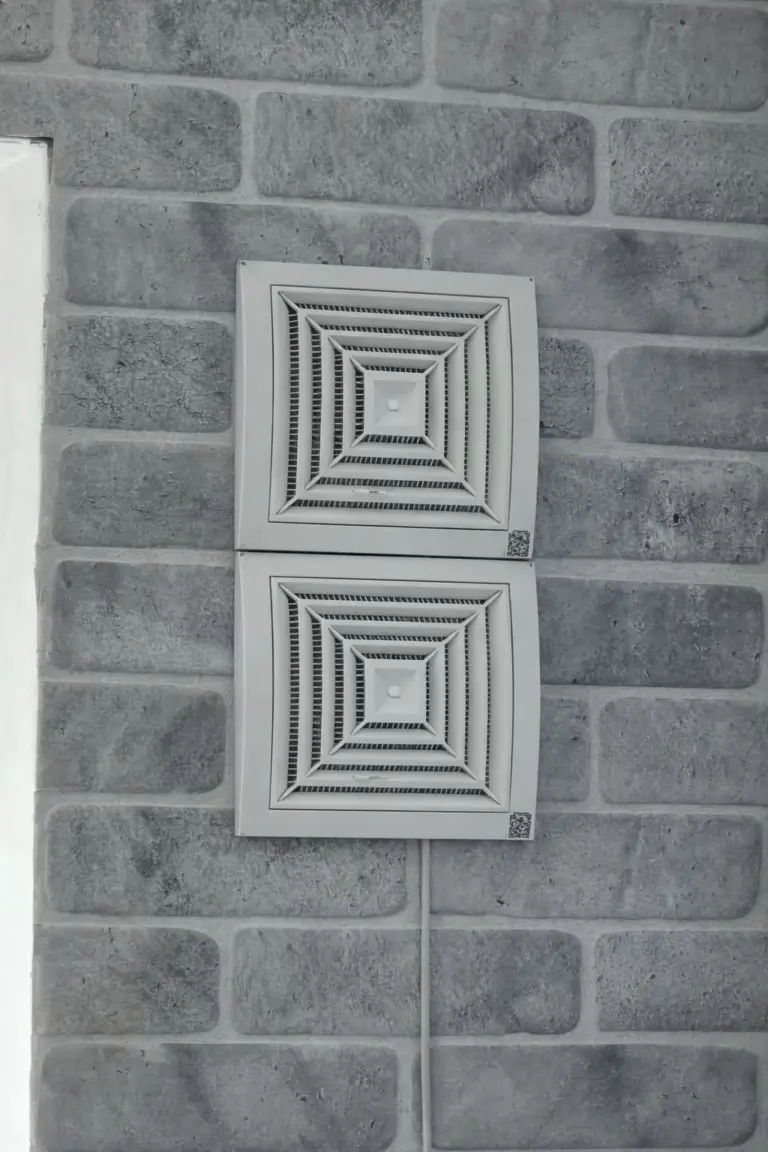 Two ARS Nordic regenerative ventilation units installed vertically on wall for balanced air supply and extract in single-room environment